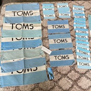 TOMS flags, bags and stickers